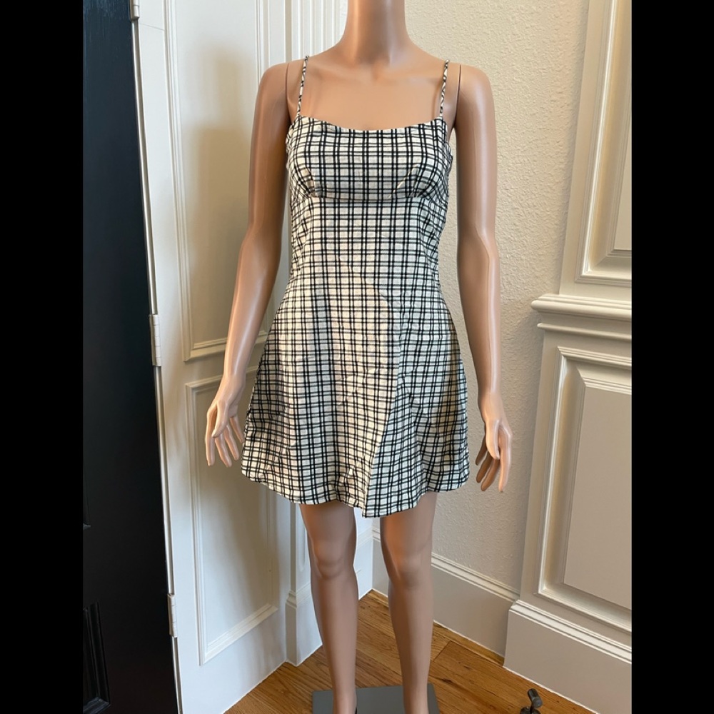 Vally dress in brandy check black/sea foam green from Motel. Size XS. NWT